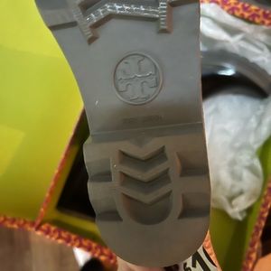 New lightly  worn knee high rain boots